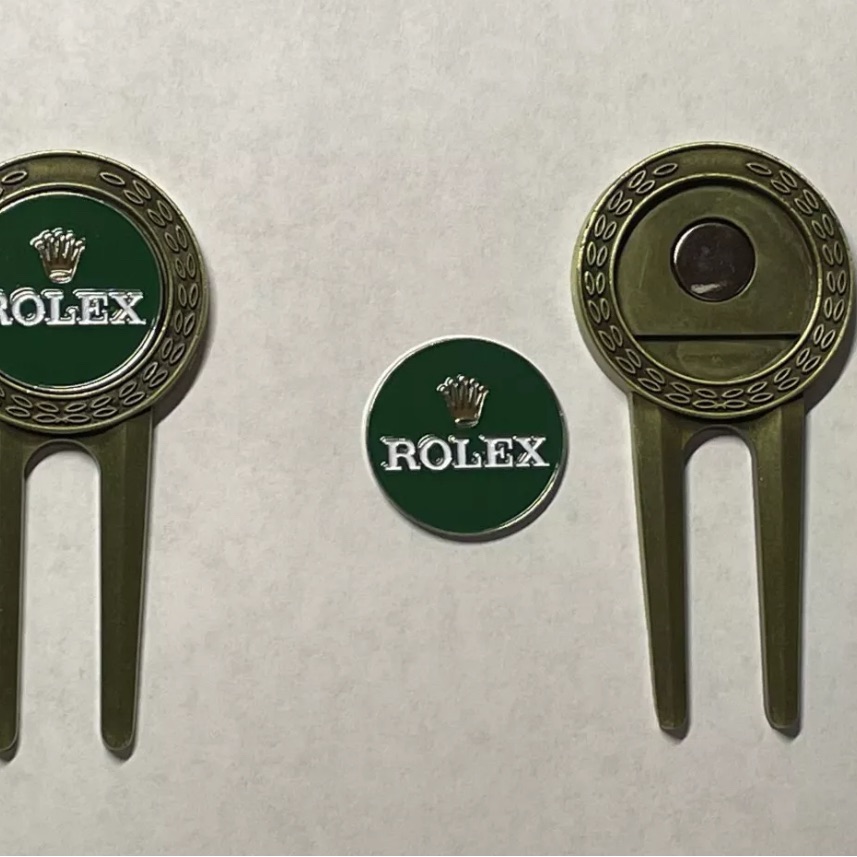 One Rolex Divot Tool And One Rolex 1 Coin Style Ball Marker